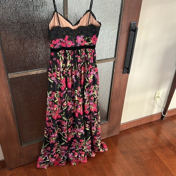 Marchesa Notte
Embroidered Lace Gown size 6 long. - Picture 10 of 14